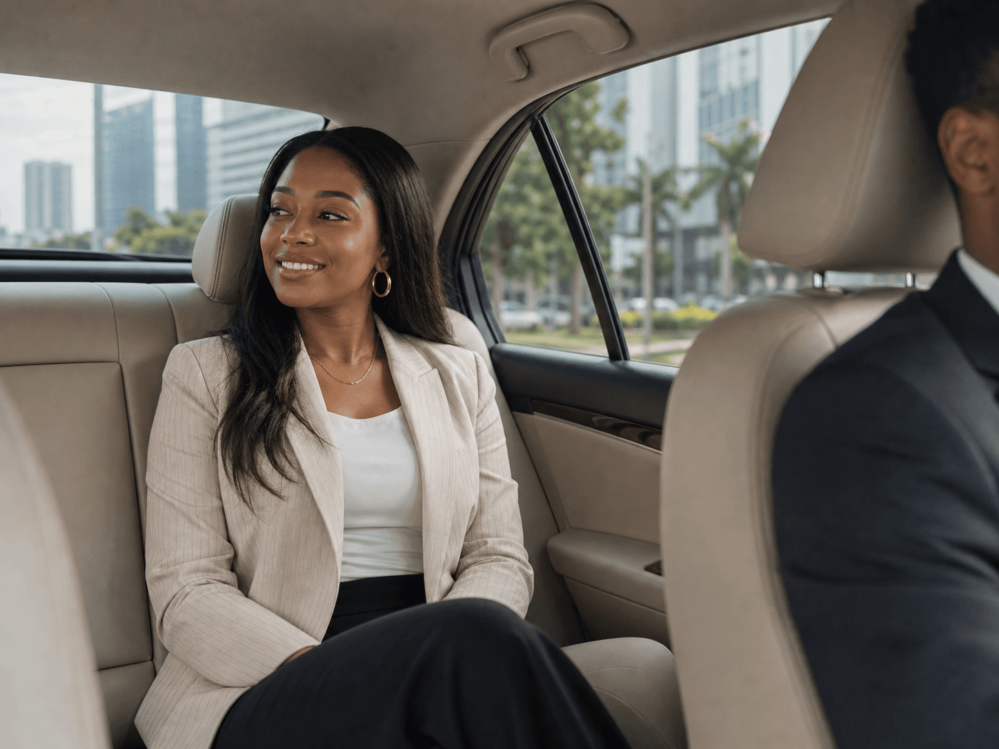 Woman enjoying a chauffeur rental